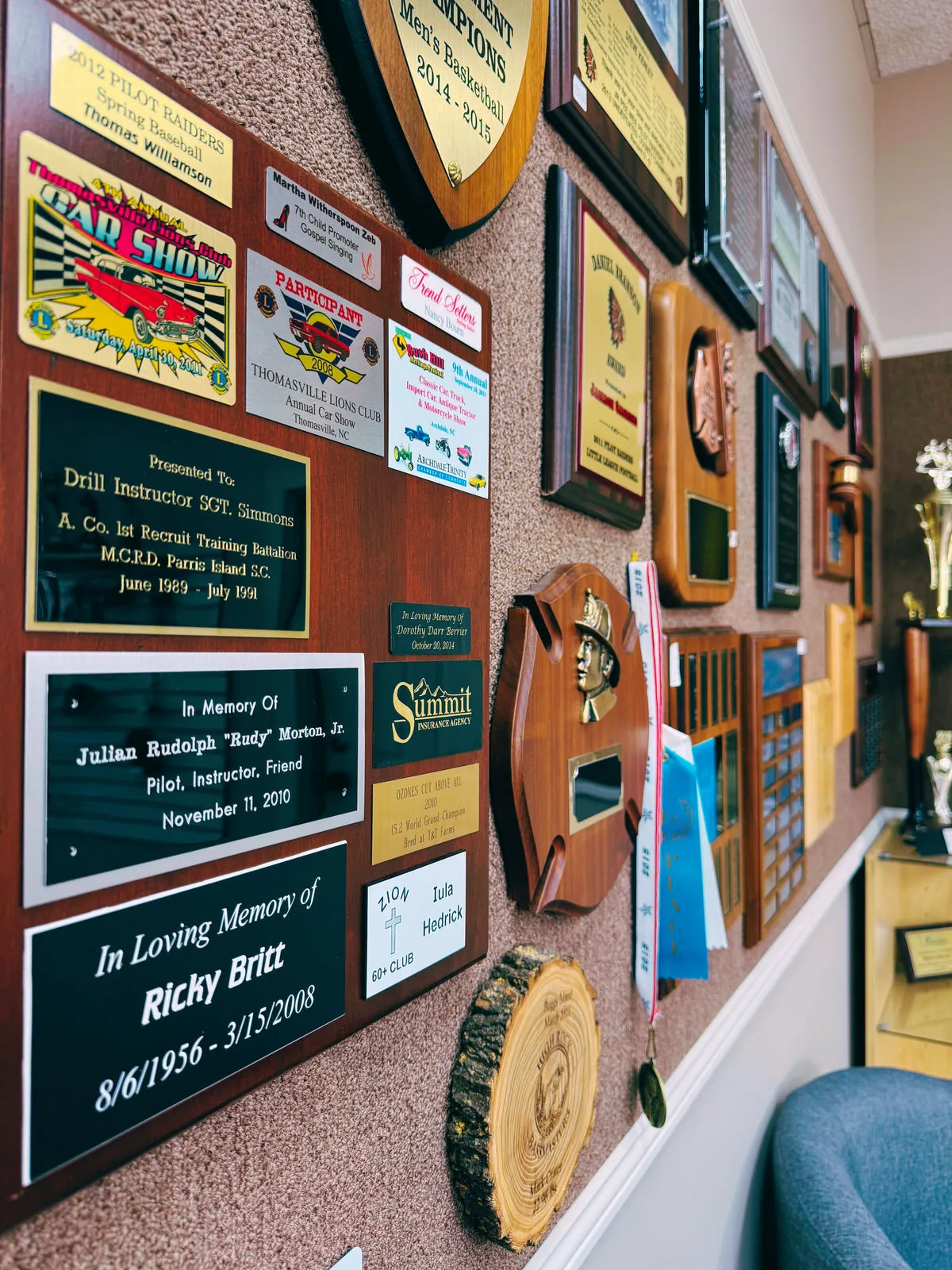 Wall of engraved plaques from local clubs, teams and memorials