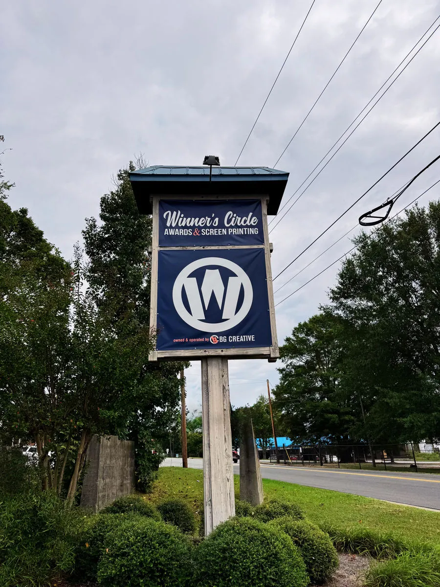 The Winner's Circle roadside sign on East Holly Hill Road
