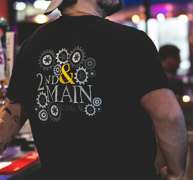 Customer wearing a screen printed 2nd & Main tee